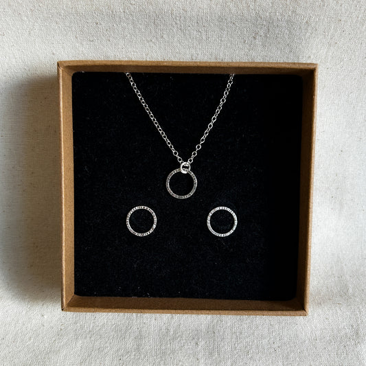 Gift set containing silver bubble earrings and matching pendant displayed in a recycled jewellery box.