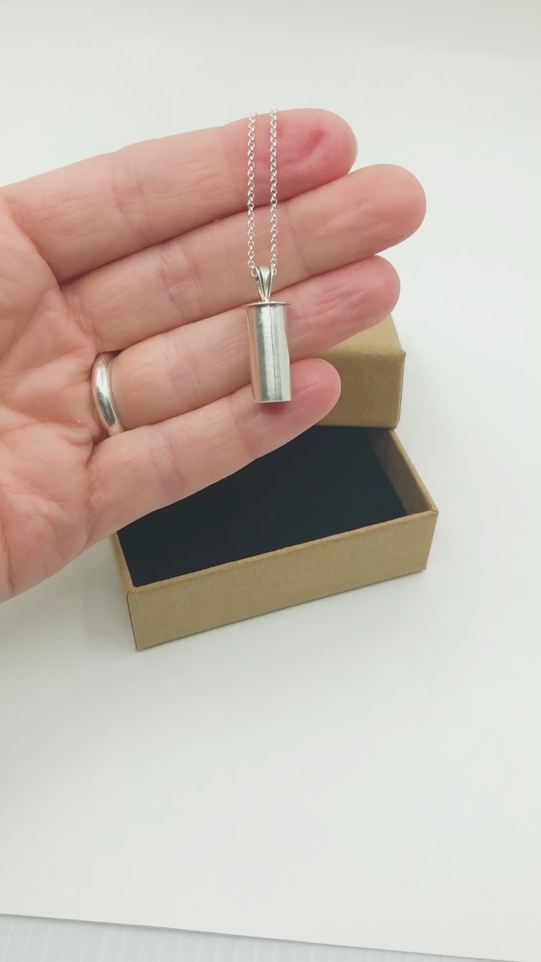 Video of Silver Pendant With Locking Lid and Bail