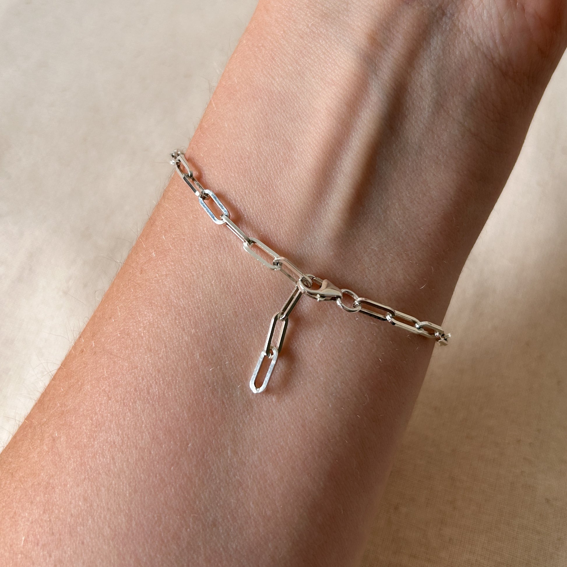Clasp side of silver paperclip bracelet 