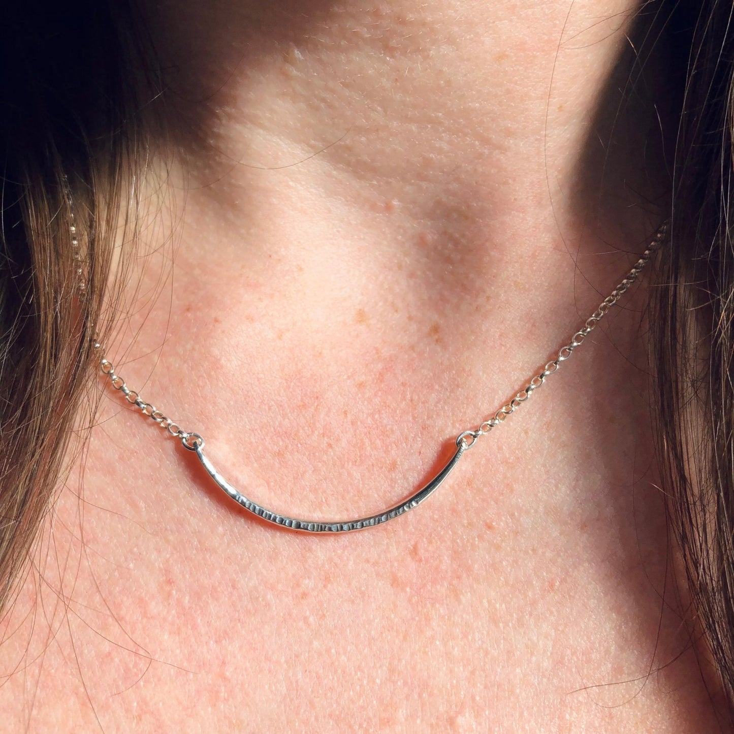 Model Wearing Curved Pendant Necklace in Sterling Silver 